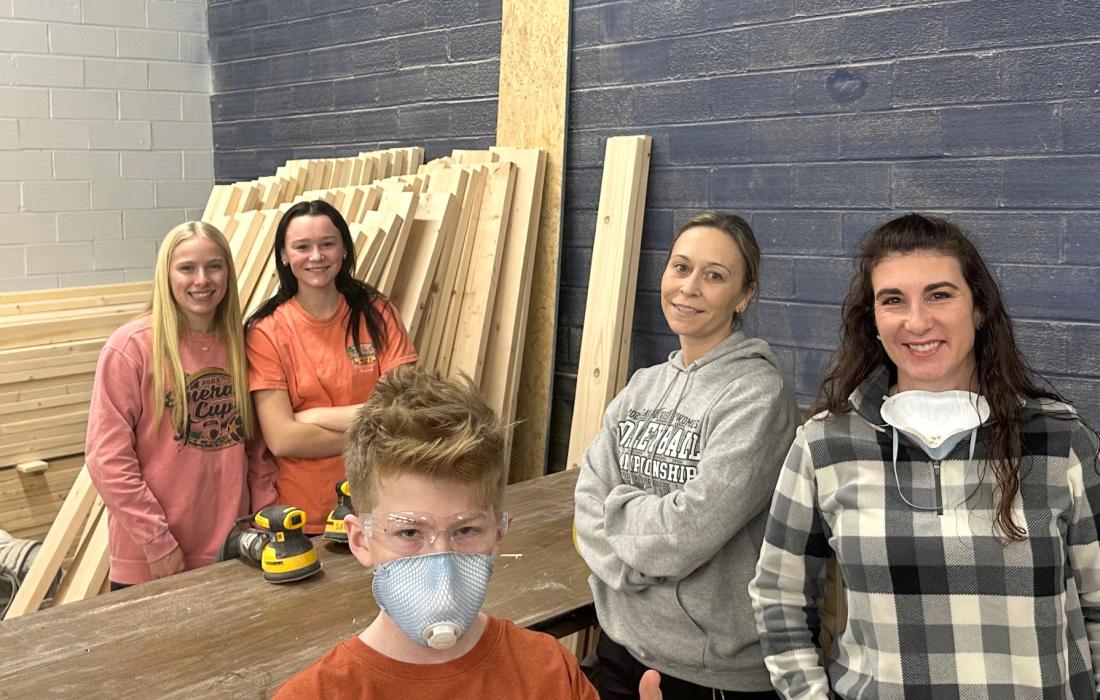 Many Panther students and their parents helped build beds at Sleep in Heavenly Peace over winter break. In this picture are from left, Katie Betsworth, Madeline Munch, Burke Barker (in mask) Liz Munch and Tasha Barker. Submitted photoMany Panther students and their parents helped build beds at Sleep in Heavenly Peace over winter break. In this picture are from left, Katie Betsworth, Madeline Munch, Burke Barker (in mask) Liz Munch and Tasha Barker. Submitted photo