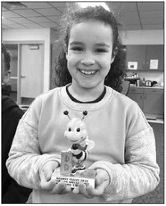 Dakota Valley 1st grader Olivia Jackson won 1st place for the word“bones”.